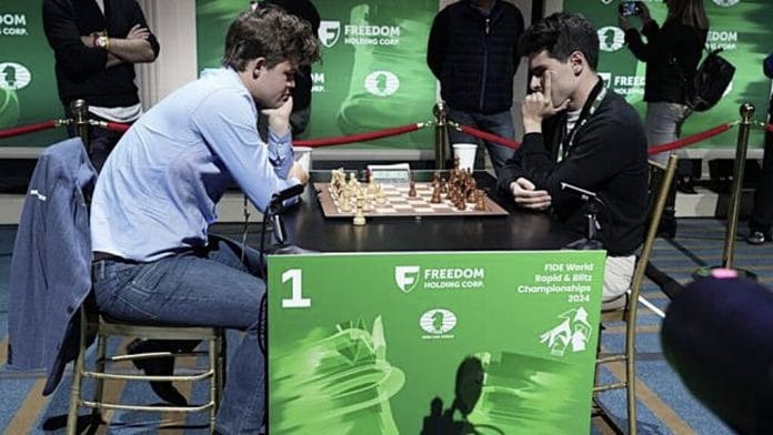 Magnus-Carlsen-blugi-1024x576-1