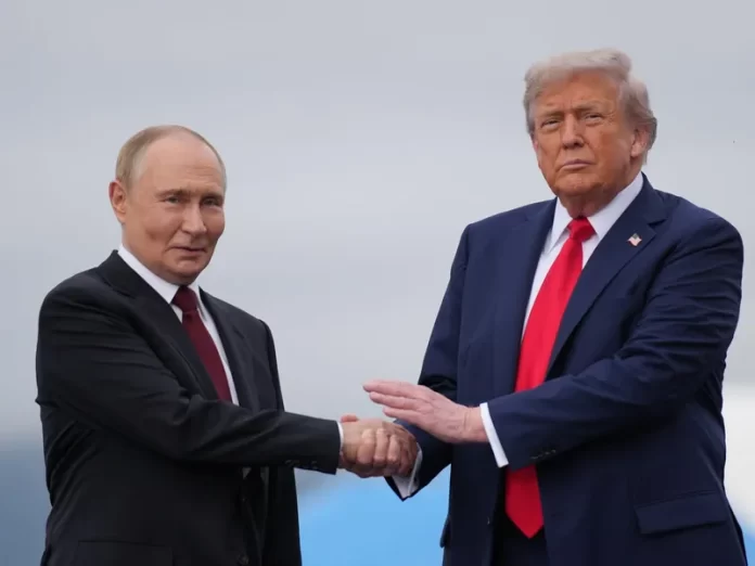 5- Trump a bătut palma cu Putin pentru peste